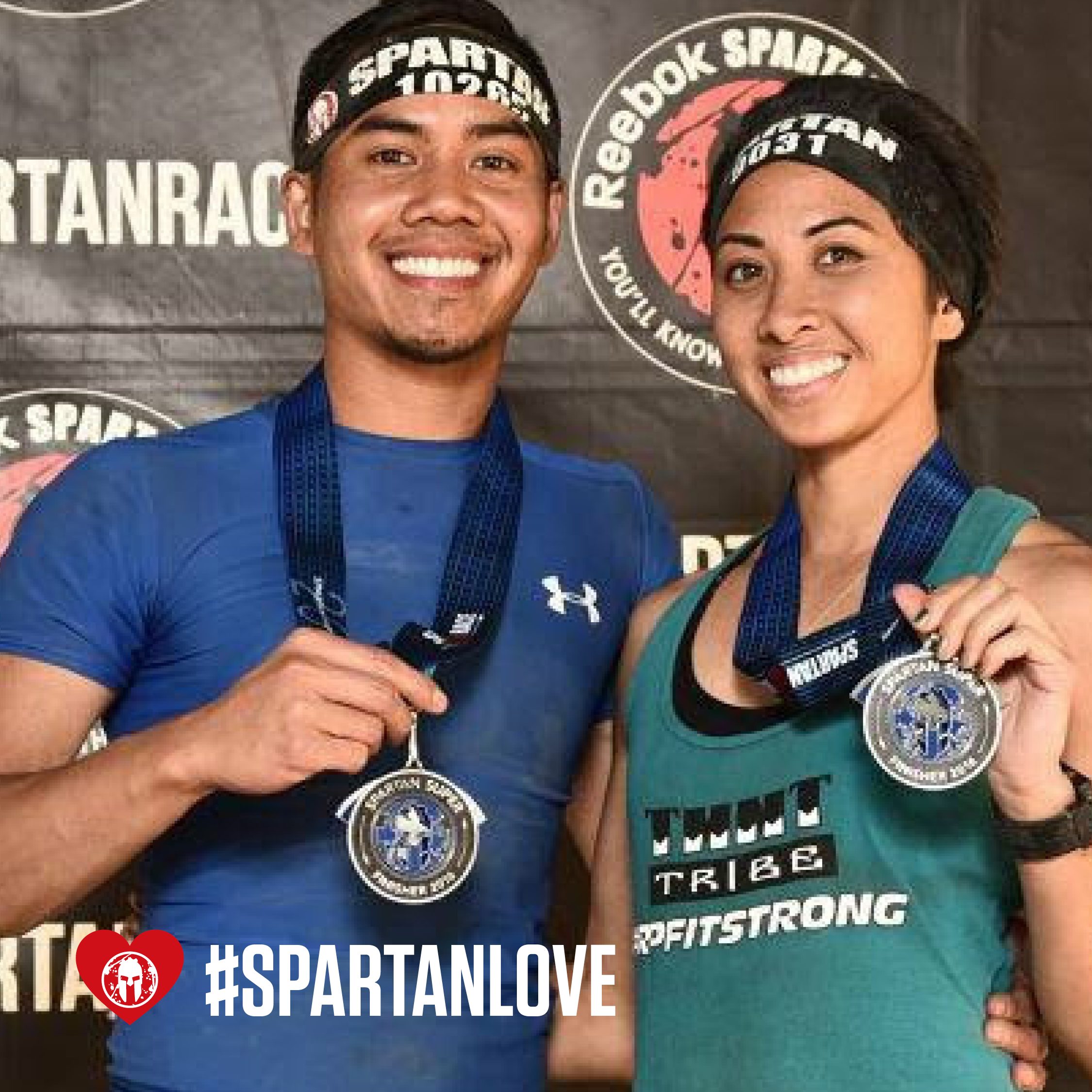 The couple with their Spartan Super medals.